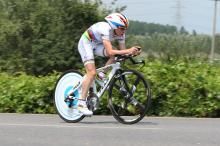 Amber Neben (Equipe Nurnberger) on the way to victory, wearing the rainbow stripes of the World Time Trial Champion.