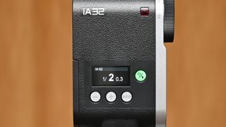 Godox iA32 product image, held in hand