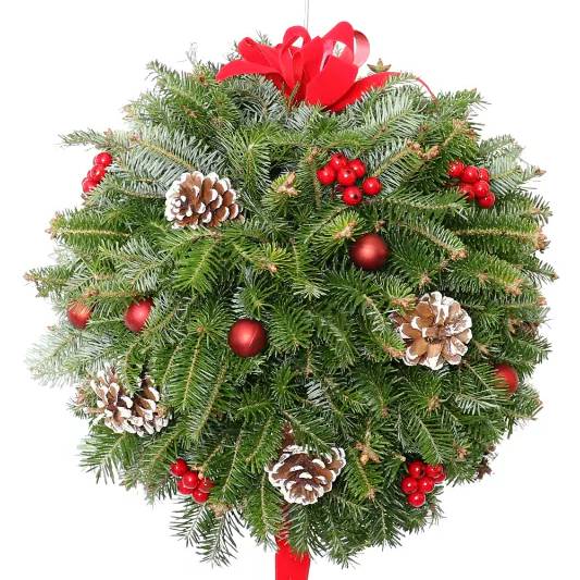 Evergreen kissing ball with pine cones and red accents