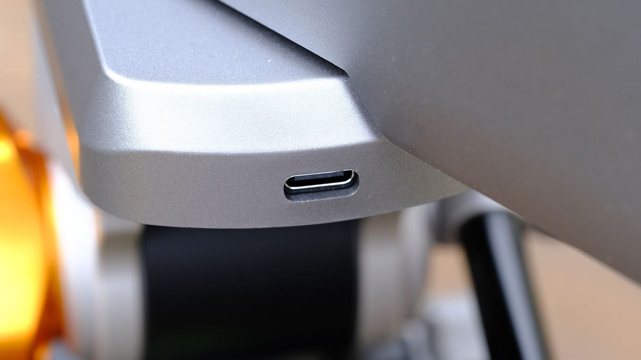 A close-up of the Dwarf III smart telescope showing its USB-C charging port