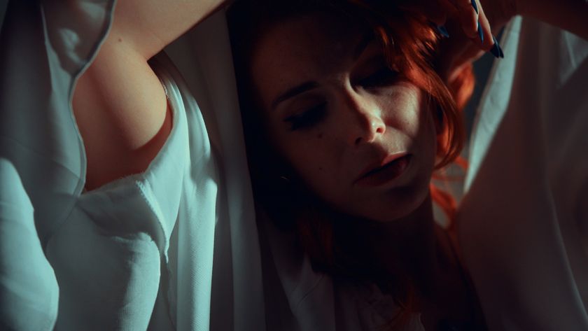 Marianna is cloaked in white in The Infectious Madness of Doctor Dekker 2