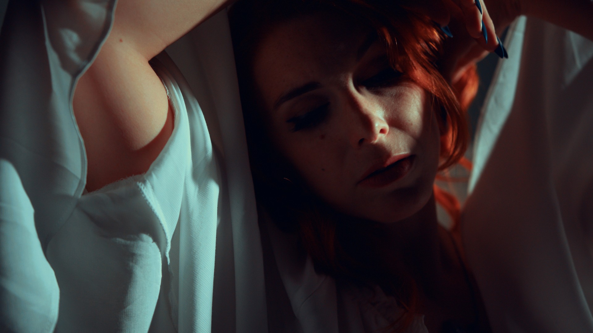 Marianna is cloaked in white in The Infectious Madness of Doctor Dekker 2