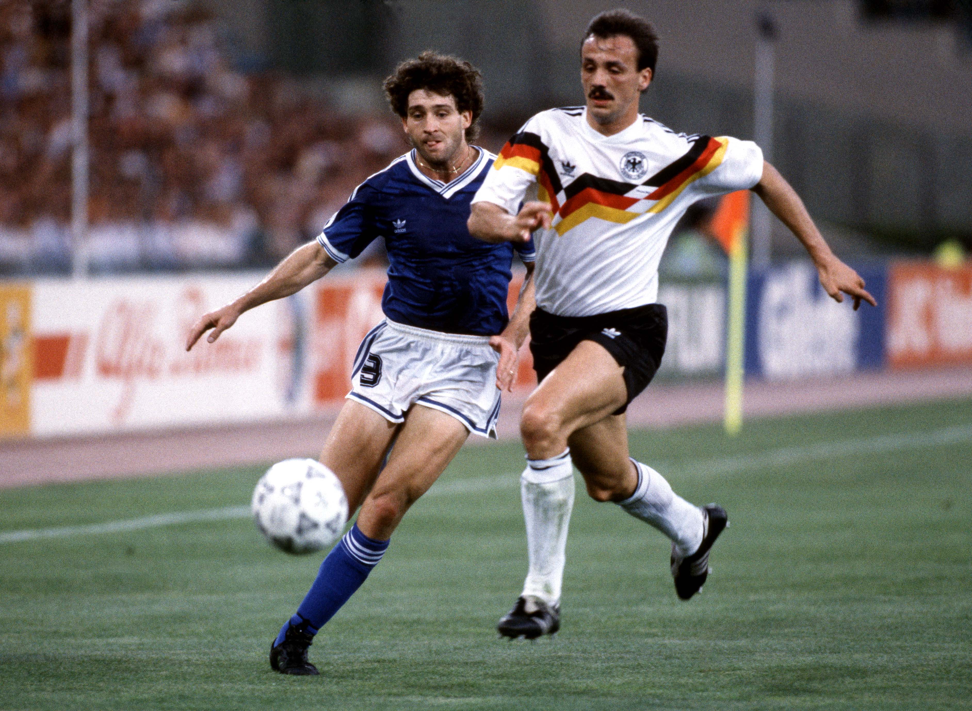 Argentina's Gustavo Dezotti battles for the ball with West Germany's Jurgen Kohler in the 1990 World Cup final.