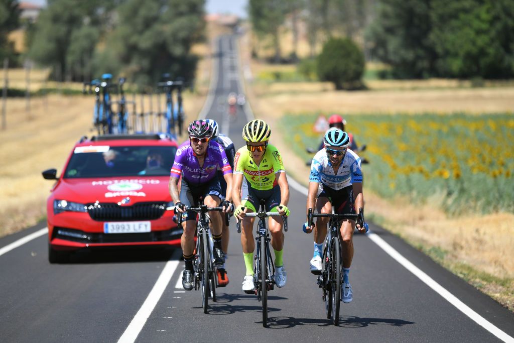 LAGUNAS DE NEILA SPAIN AUGUST 01 Angel Madrazo Ruiz of Spain and Team BurgosBH Arjen Livyns of Belgium and Team Bingoal WB Daniel Navarro Garcia of Spain and Team Israel StartUp Nation Breakaway during the 42nd Vuelta a Burgos 2020 Stage 5 a 158km stage from Covarrubias to Lagunas de Neila 1872m VueltaBurgos on August 01 2020 in Lagunas de Neila Spain Photo by David RamosGetty Images