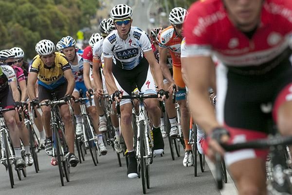 David Tanner (centre) of the Saxo-Bank team from Victoria out of the saddle on the climb up the Midland Highway.