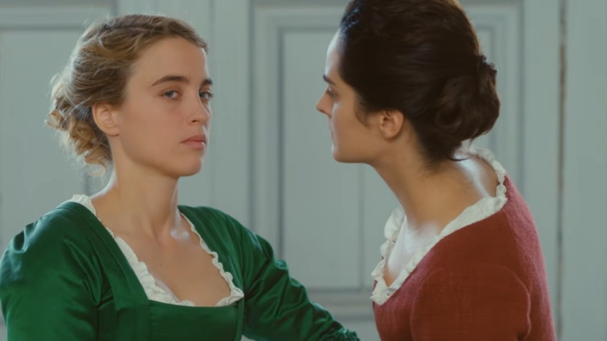 No&amp;eacute;mie Merlant staring lovingly at Ad&amp;egrave;le Haenel in Portrait of a Lady on Fire