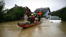 Firemen navigate flooding in Austria after Storm Boris