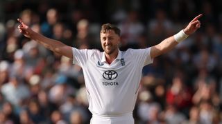 England bowler Ollie Robinson celebrates after taking his 5th wicket of the innings