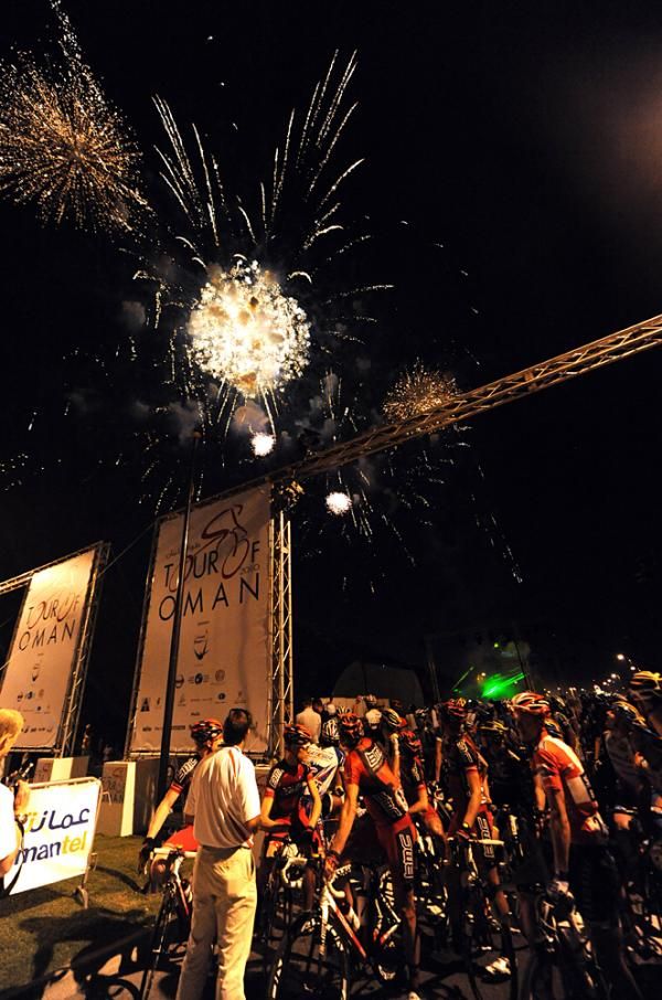 Riders are treated to a fireworks display before the opening of the inaugural Tour of Oman