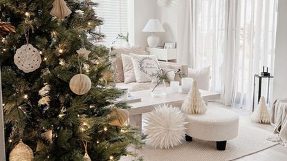 White themed living room decorated for Christmas