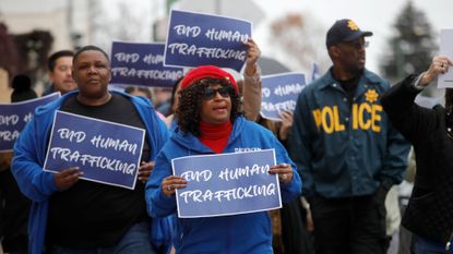 Protesters march to end human trafficking in Oakland, California.