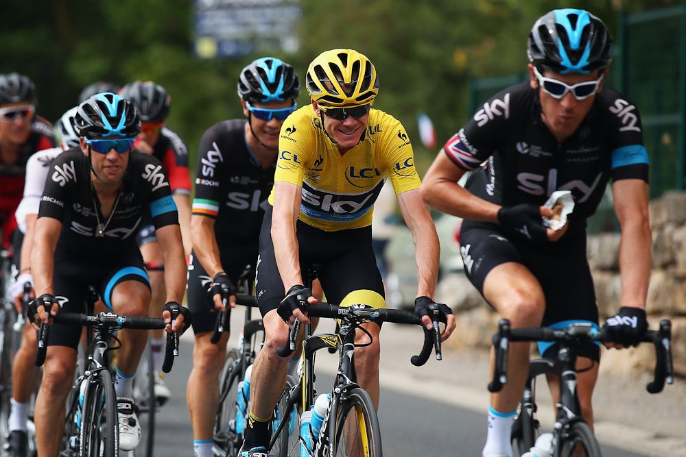 Chris Froome rides in the Sky train during stage 14.