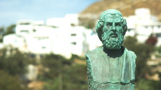 A photo of a copper bust of Homer