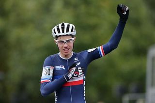 Lucas Dubau (France) celebrates his win in the junior men's race at the 'cross World Cup in Valkenburg