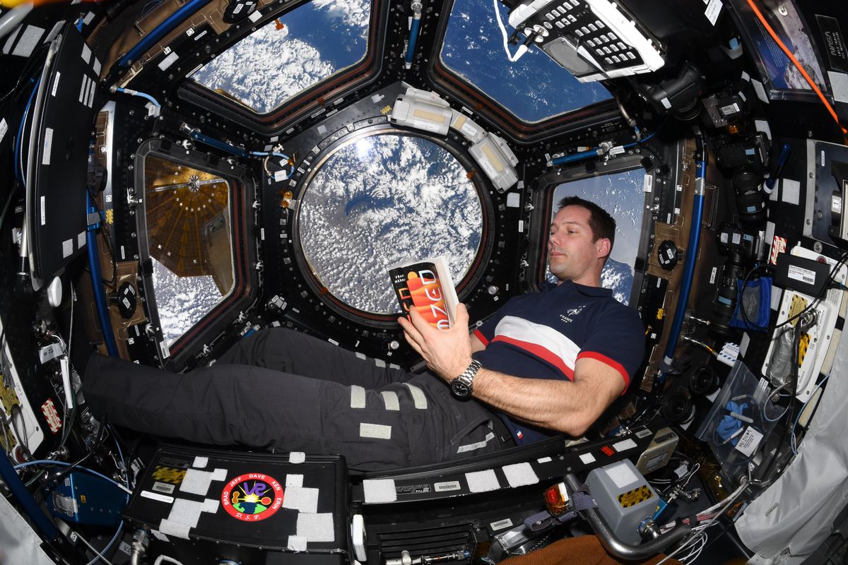 French astronaut Thomas Pesquet reads &quot;Dune&quot; aboard the International Space Station.