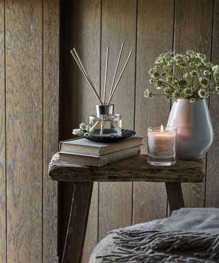 A diffuser and candle by The White Company