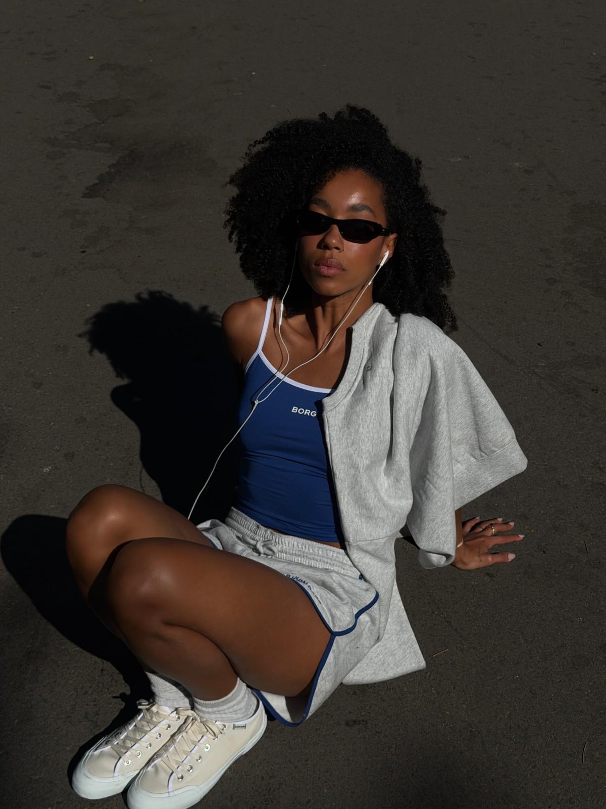 Amaka Hamelijnck in canvas sneakers