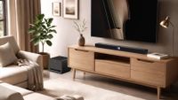 Wiim soundbar on a light brown table under a TV.