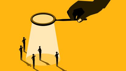 An illustration of a giant hand shining light on five tiny employees against a yellow background, to represent bossware.