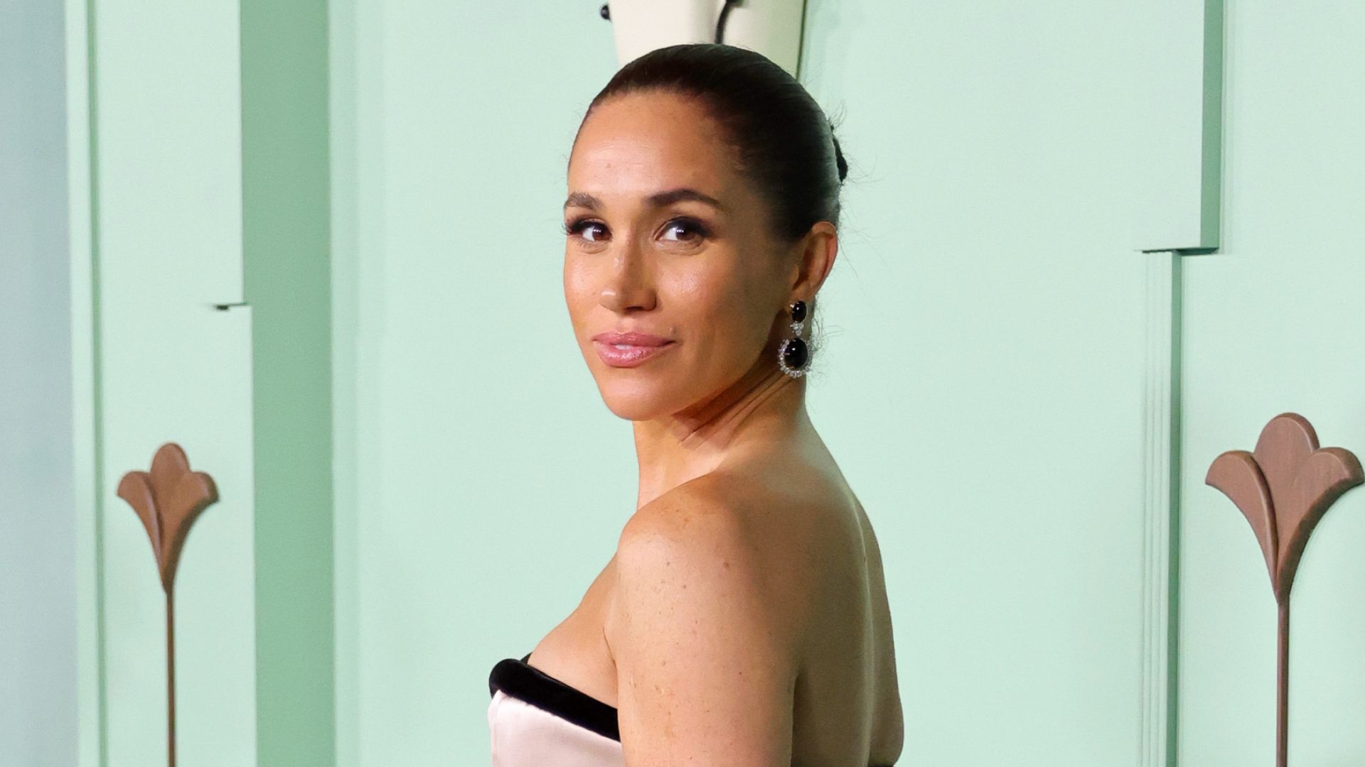 marieclaire.com - Amy Mackelden - Meghan Markle Makes a Dramatic Entrance in a Strapless Gown and Long Cloak