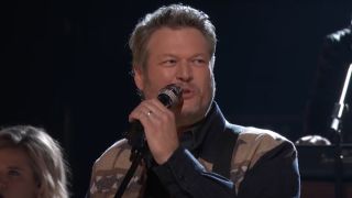 Blake Shelton performs on The Voice.