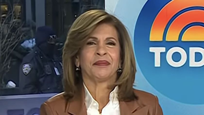 Hoda Kotb in brown jacket hosting Today Show