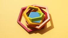 Multicolored puzzle blocks on top of each other but all askew.