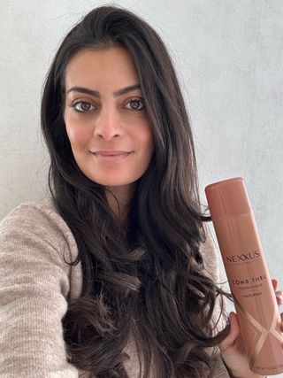 Michelle Rostamian enjoys the brushable texture the Nexxus Comb Thru Finishing Spray gives her hair.