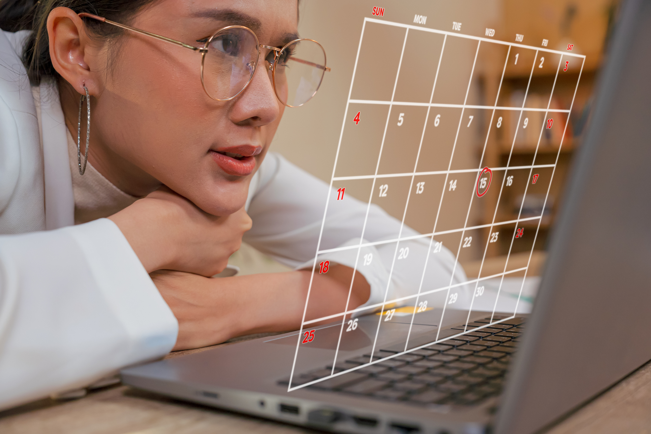 person looking at tax calendar