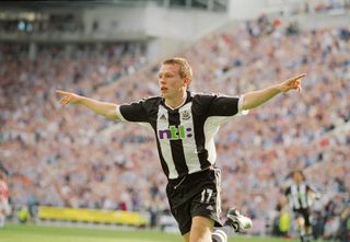 26 Aug 2001: Craig Bellamy of Newcastle United celebrates scoring a goal during the FA Barclaycard Premiership North East derby match between Newcastle United and Sunderland played at St. James Park in Newcastle, England. The match ended in a 1 - 1 draw. \ Mandatory Credit: Laurence Griffiths /Allsport