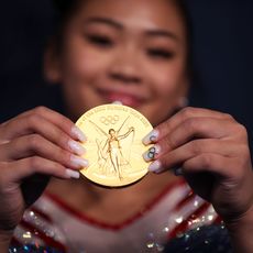 tokyo, japan july 29 sunisa lee of team united states poses with her gold medal after winning the womens all around final on day six of the tokyo 2020 olympic games at ariake gymnastics centre on july 29, 2021 in tokyo, japan photo by laurence griffithsgetty images