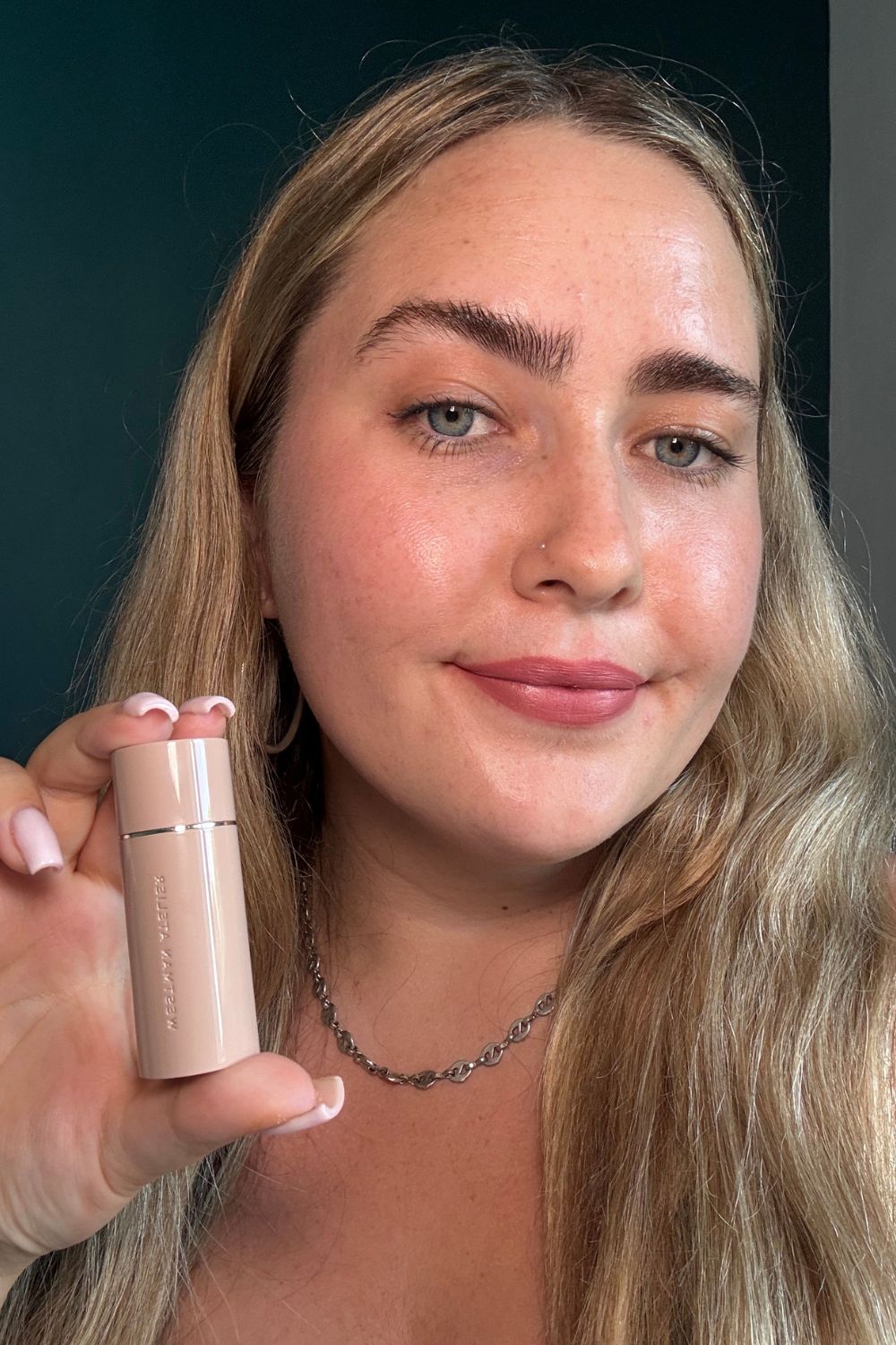 Amelia wearing Westman Atelier matte lipstick