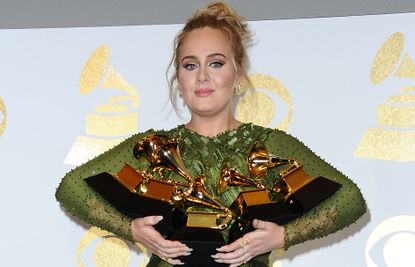 Adele poses in the press room at the 59th GRAMMY Awards at Staples Center on February 12, 2017 in Los Angeles