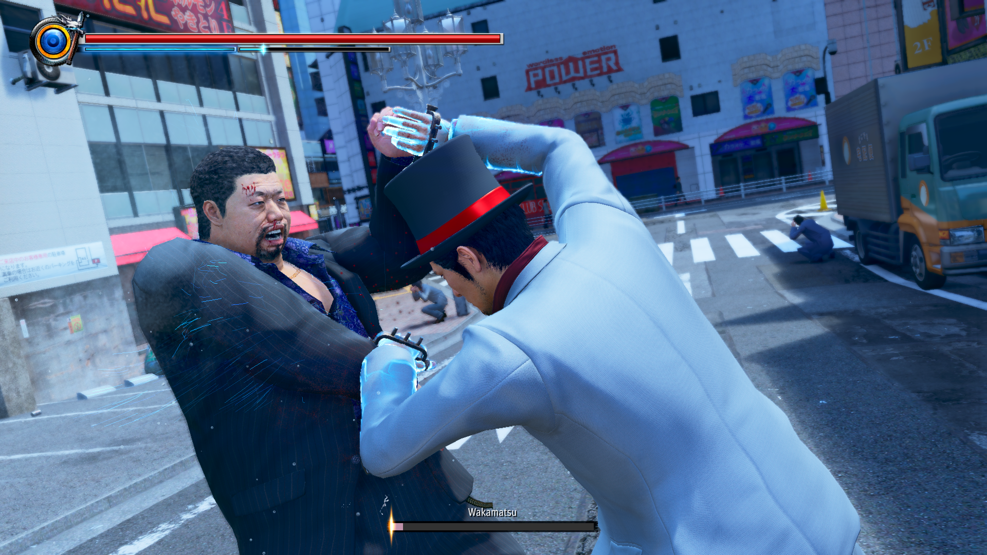 A fight in the street in Yakuza Kiwami 3.