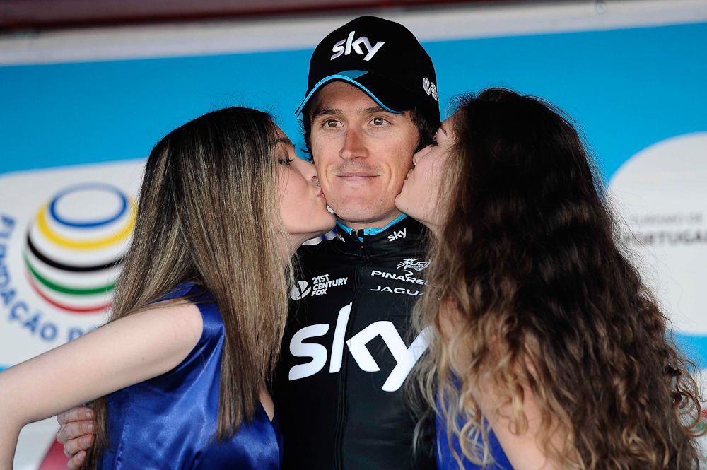 Thomas celebrates his stage win on the podium.