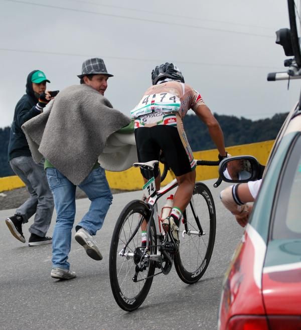 A rider is cheered along
