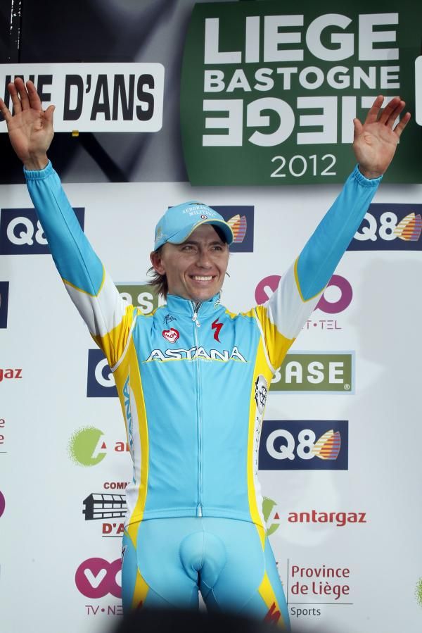 Maxim Iglinskiy (Astana) salutes from the podium.