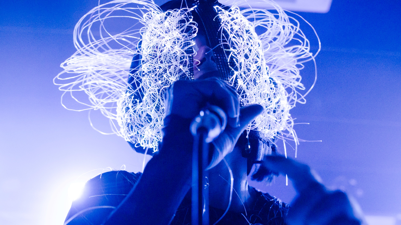 Julie Christmas performing onstage in 2024
