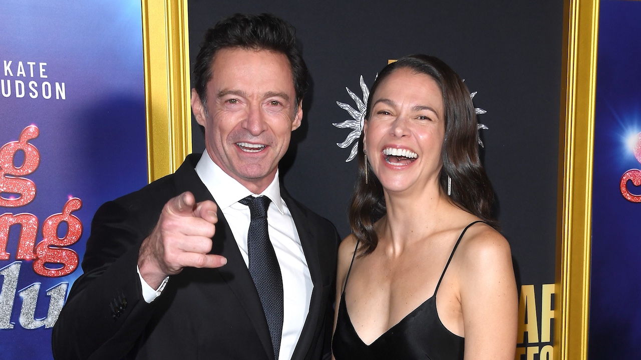 Jackman and Foster smiling at the carpet for Closing Night Gala Premiere Of &quot;Song Sung Blue&quot; at TCL Chinese Theatre