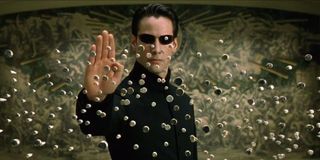 Keanu Reeves stopping bullets in The Matrix Reloaded