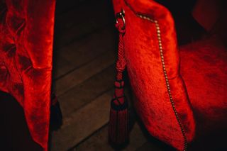 Red velvet chairs, detail
