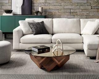 A modern coffee table with sculptural base