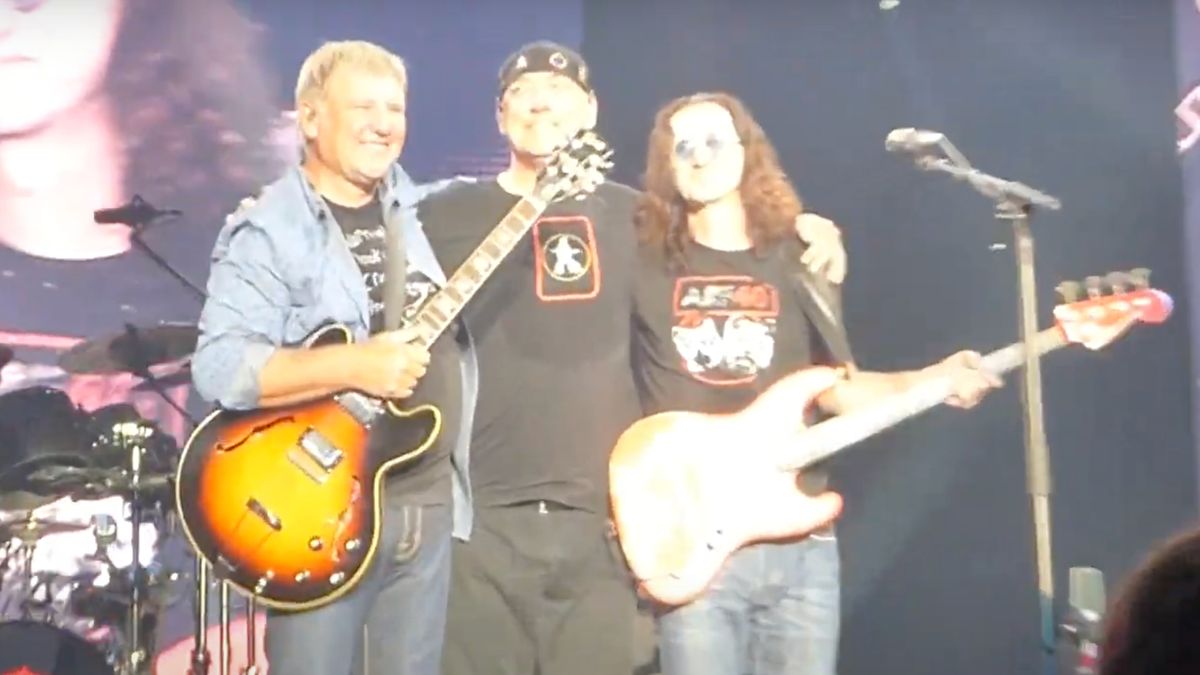 Rush embrace at their final gig, 2015