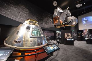The new APOLLO exhibit at The Museum of Flight in Seattle is designed around "anchor artifacts," including Apollo Command Module 007A, the first production-line capsule delivered to NASA for testing and training, and a full-size model of the ascent stage of the Apollo lunar module.