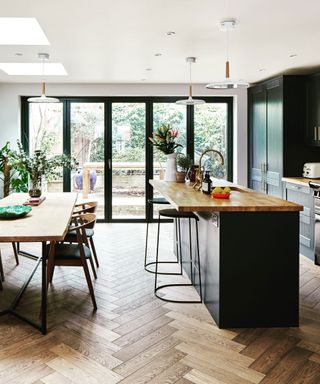 Kitchen extension with green cabinetry