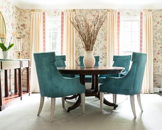 Traditional dining room styled by Caroline Brackett with teal velvet dining chairs