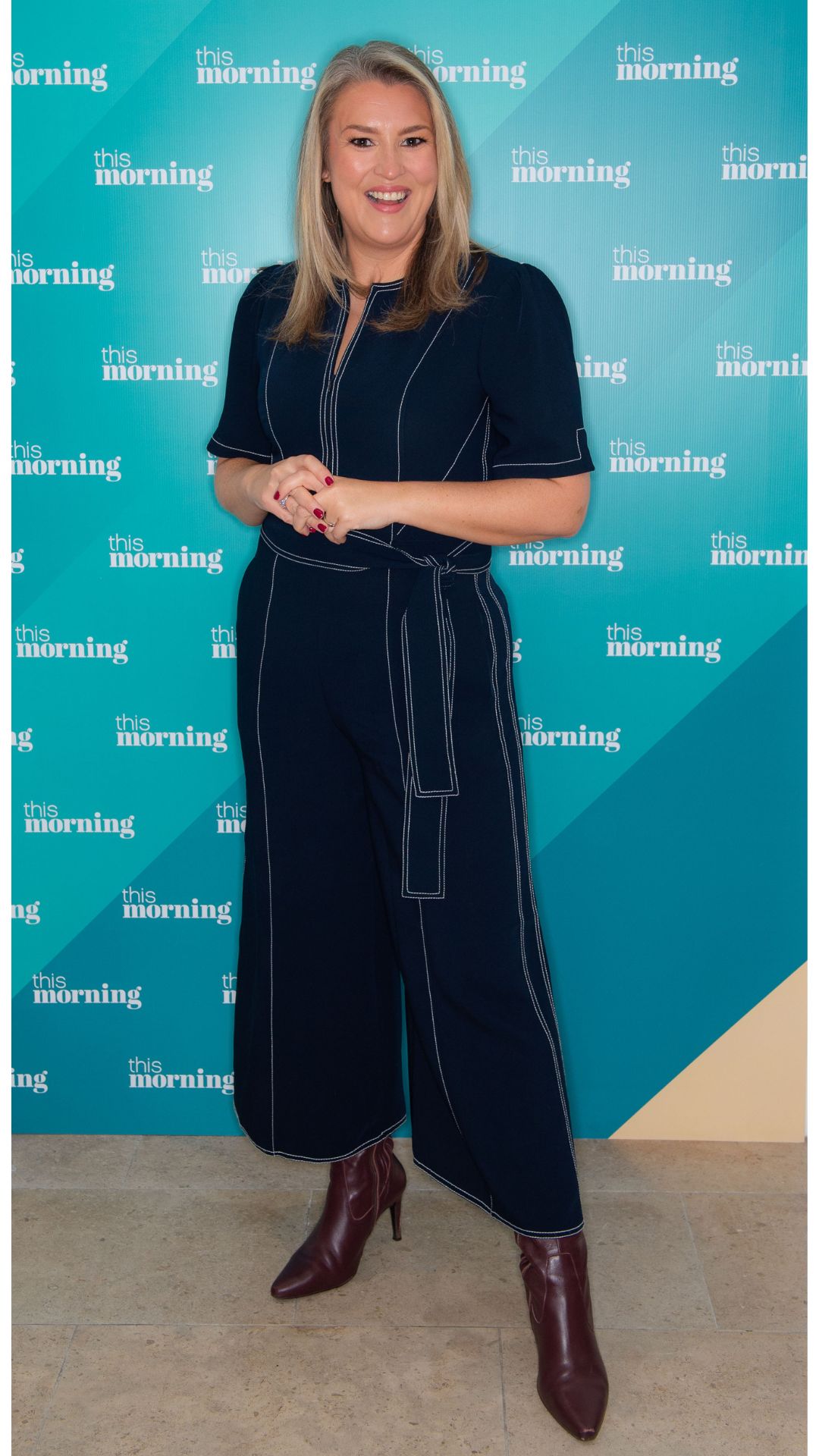 sara davies wearing a blue me+em jumpsuit