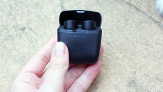 true wireless earbuds in a charging case