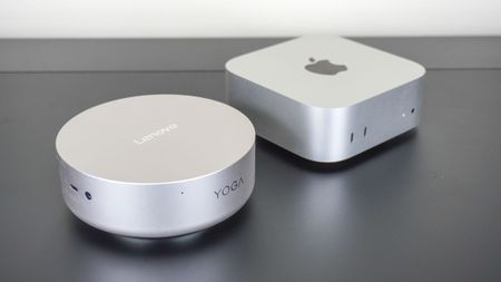 The Lenovo Yoga Mini next to the Apple Mac mini M4 on a desk