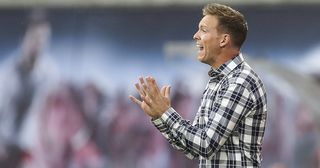 Julian Nagelsmann head coach of RB Leipzig reacts during the Bundesliga match between RB Leipzig and FC Bayern Muenchen at Red Bull Arena on September 14, 2019 in Leipzig, Germany.